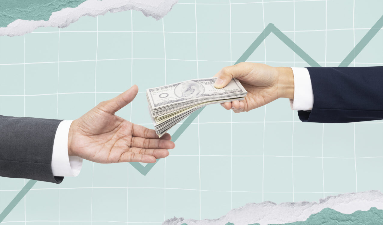 Hands exchanging cash, symbolizing fast and reliable financing support, personal loans, and trusted borrowing solutions from Khalon & Gill.